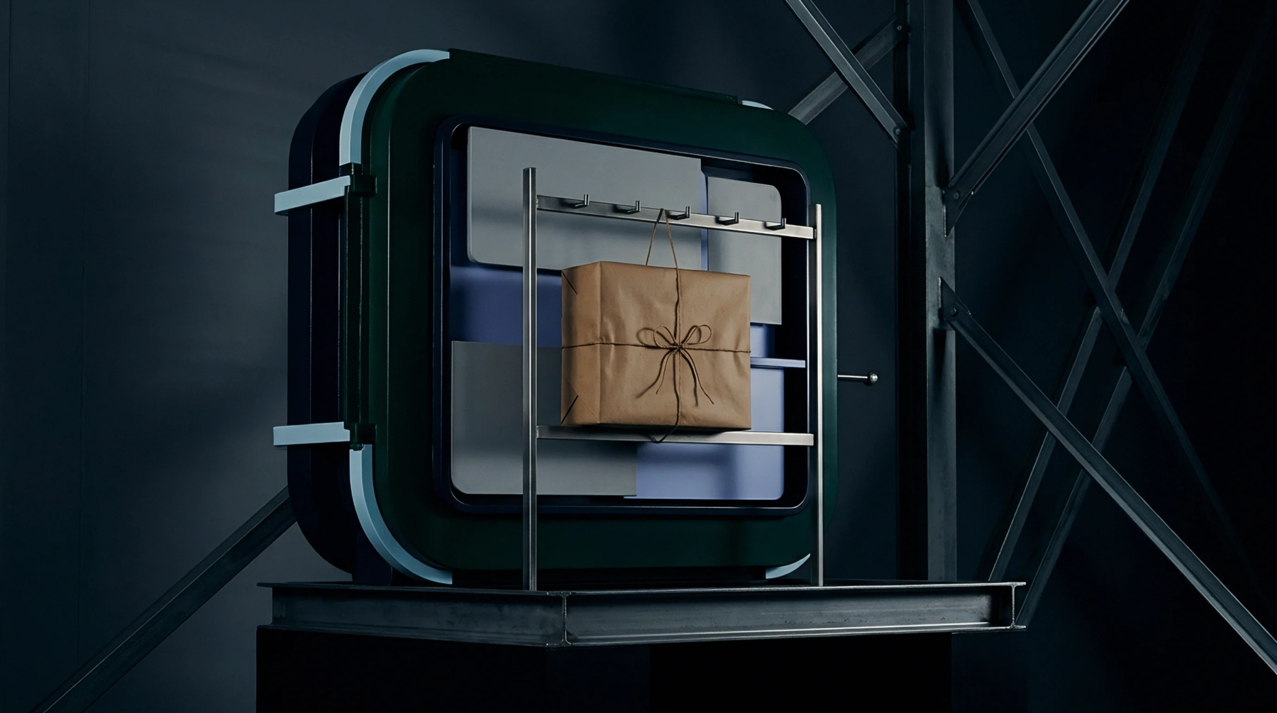 This render shows a brown paper parcel suspended from a metal rack inside a dark green modular chamber, suggesting a controlled industrial processing environment.